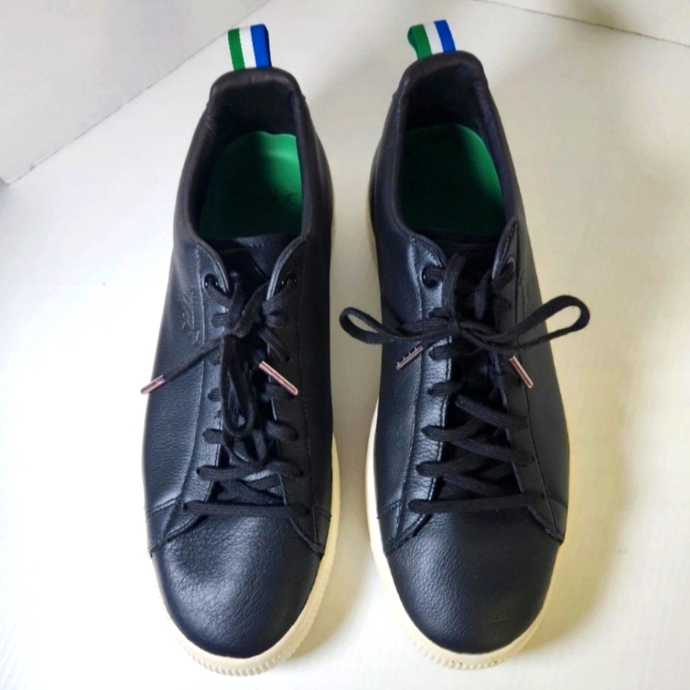 Puma Black Sneakers with Low-Top Design and White Sole